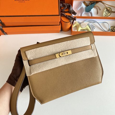 에르메스 Hermès Kelly Dépêches 25 Pouch in Gold